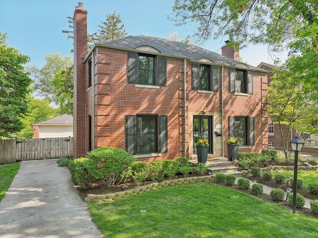441 Roland Rd, Grosse Pointe Farms, MI 48236 - view of front of house featuring a chimney and brick siding