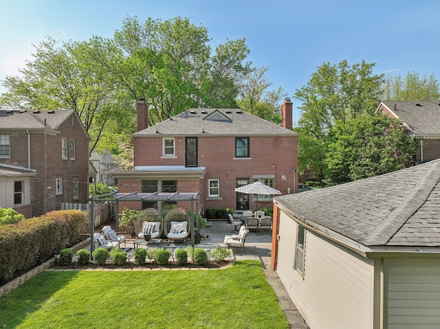 441 Roland Rd, Grosse Pointe Farms, MI 48236 - rear view of house with a chimney, outdoor lounge area, and a patio