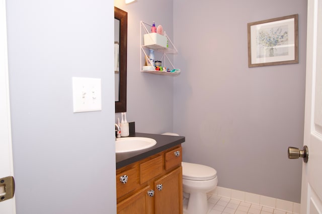 46265 Cavalier Dr, Macomb, MI 48044 - half bath featuring vanity, toilet, and tile patterned floors
