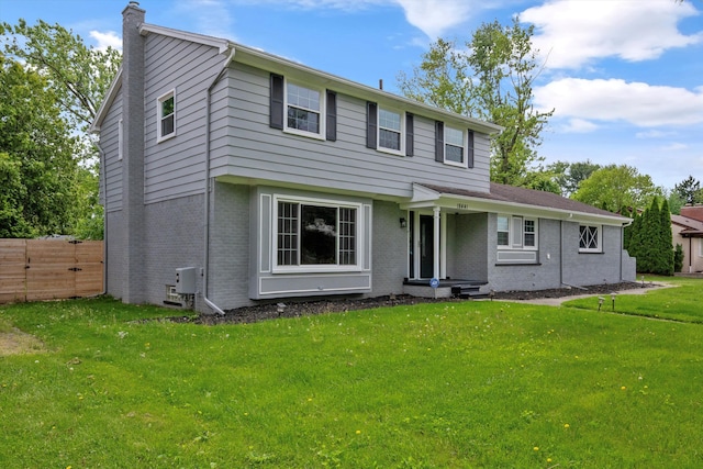 18441 Roseland Blvd, Lathrup Village, MI 48076 - view of front of home with a chimney and brick siding