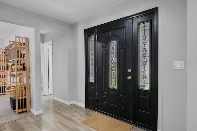 18441 Roseland Blvd, Lathrup Village, MI 48076 - foyer entrance featuring light wood finished floors and baseboards