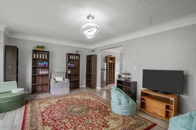 18441 Roseland Blvd, Lathrup Village, MI 48076 - office with wood finished floors, baseboards, and a chandelier
