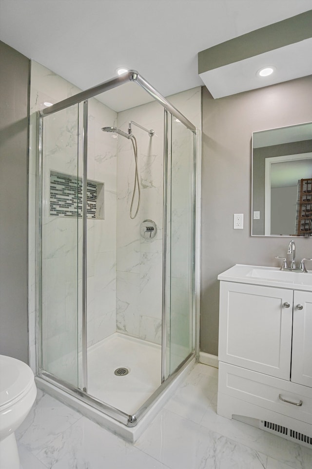 18441 Roseland Blvd, Lathrup Village, MI 48076 - full bath with marble finish flooring, a shower stall, toilet, and recessed lighting