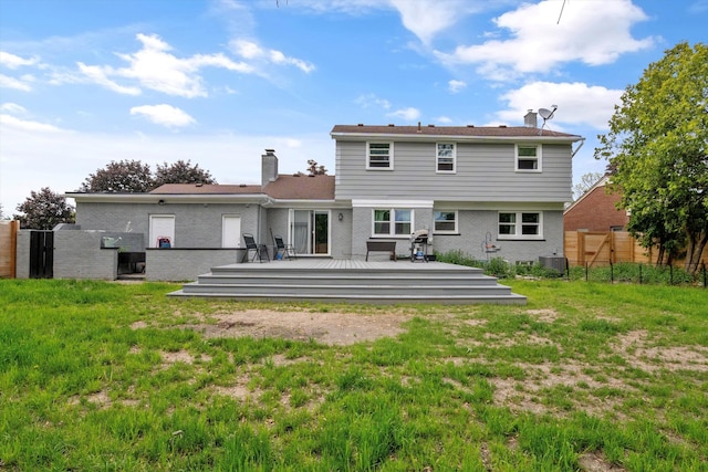 18441 Roseland Blvd, Lathrup Village, MI 48076 - rear view of property featuring a wooden deck, central air condition unit, and a chimney