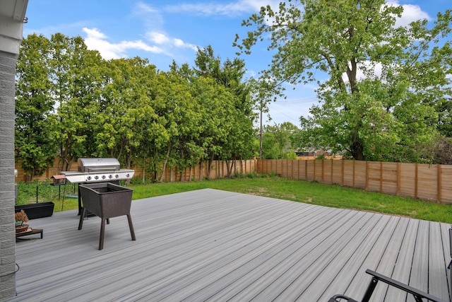 18441 Roseland Blvd, Lathrup Village, MI 48076 - wooden deck with a grill and view of wooded area