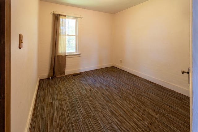 10465 Range Line Rd, Berrien Springs, MI 49103 - unfurnished room with baseboards and dark wood-style floors
