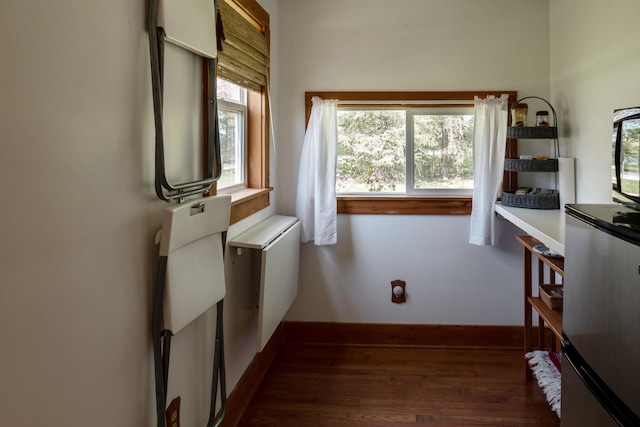 10465 Range Line Rd, Berrien Springs, MI 49103 - laundry room featuring wood finished floors and baseboards