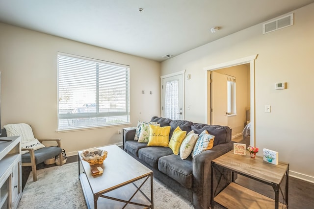 630 S Garfield Ave Unit 107, Traverse City, MI 49686 - living room featuring baseboards