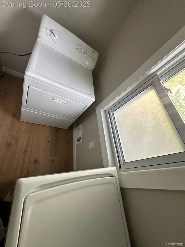 1228 E Jarvis Ave, Hazel Park, MI 48030 - washroom featuring washer / dryer and wood finished floors