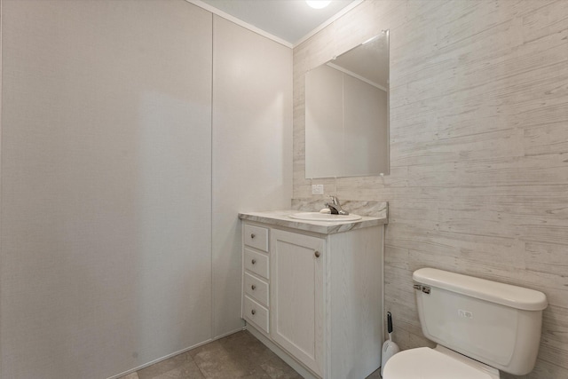 16747 Williamsville St, Vandalia, MI 49095 - bathroom with ornamental molding, toilet, and vanity