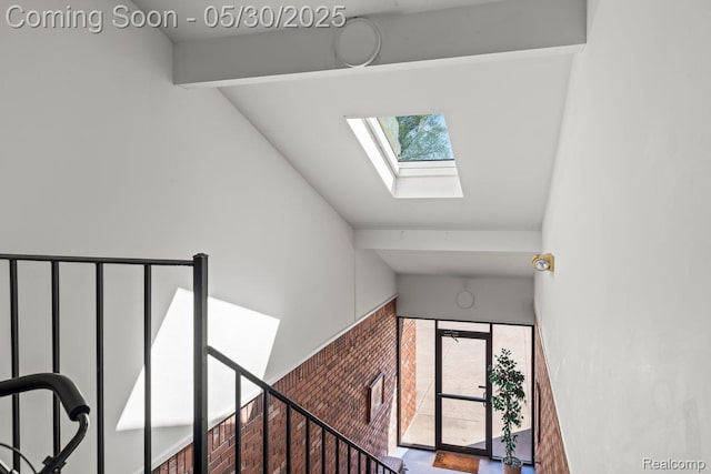 9200 River Rd Unit 3, Clay, MI 48001 - staircase featuring a skylight and healthy amount of natural light