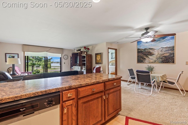 9200 River Rd Unit 3, Clay, MI 48001 - kitchen with dishwasher, open floor plan, ceiling fan, brown cabinets, and dark countertops