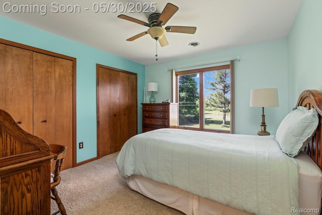 9200 River Rd Unit 3, Clay, MI 48001 - bedroom featuring multiple closets, carpet floors, and ceiling fan