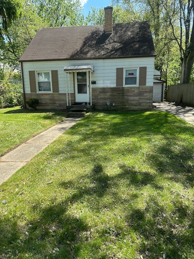 187 Crestwood St, Pontiac, MI 48341 - view of front facade featuring a chimney and stone siding