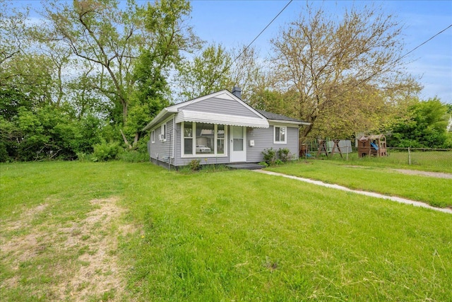 228 Hughes Ave, Pontiac, MI 48341 - view of front of property with a chimney