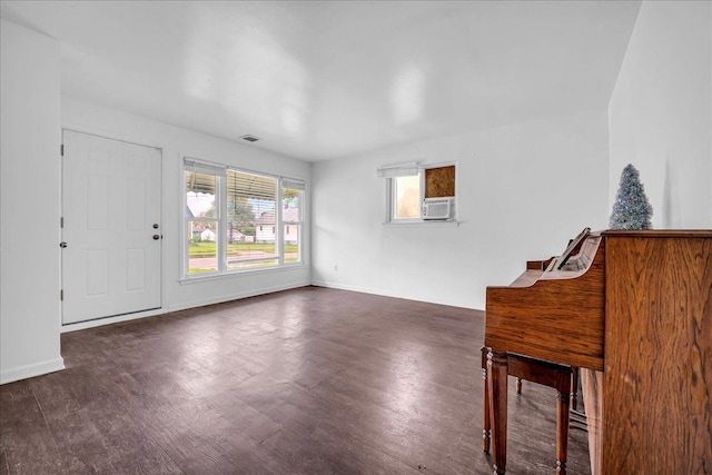 228 Hughes Ave, Pontiac, MI 48341 - entryway with wood finished floors, baseboards, and cooling unit