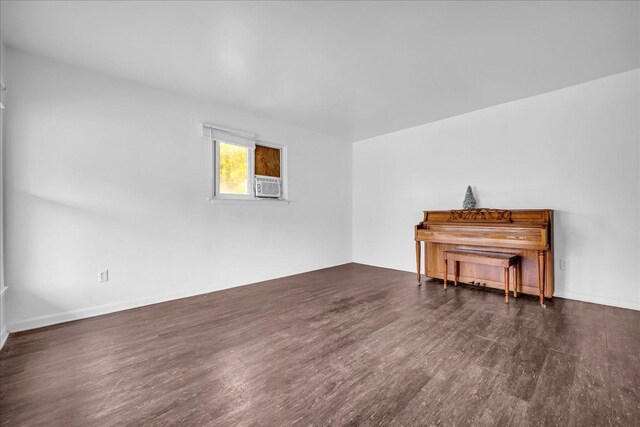 228 Hughes Ave, Pontiac, MI 48341 - living area featuring wood finished floors and cooling unit