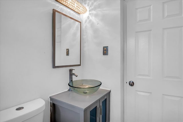 228 Hughes Ave, Pontiac, MI 48341 - bathroom featuring vanity and toilet