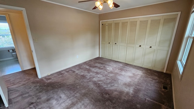 938 Little Hill Ct, Rochester Hills, MI 48307 - unfurnished bedroom featuring carpet, crown molding, baseboards, a closet, and a ceiling fan