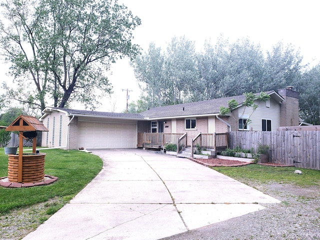 15701 Middlebelt Rd, Romulus, MI 48174 - single story home featuring driveway, an attached garage, and brick siding