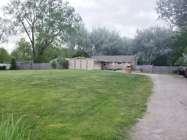 15701 Middlebelt Rd, Romulus, MI 48174 - view of front facade featuring a garage and driveway