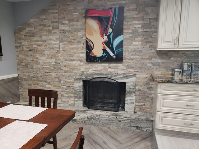 15701 Middlebelt Rd, Romulus, MI 48174 - living area featuring a fireplace with raised hearth