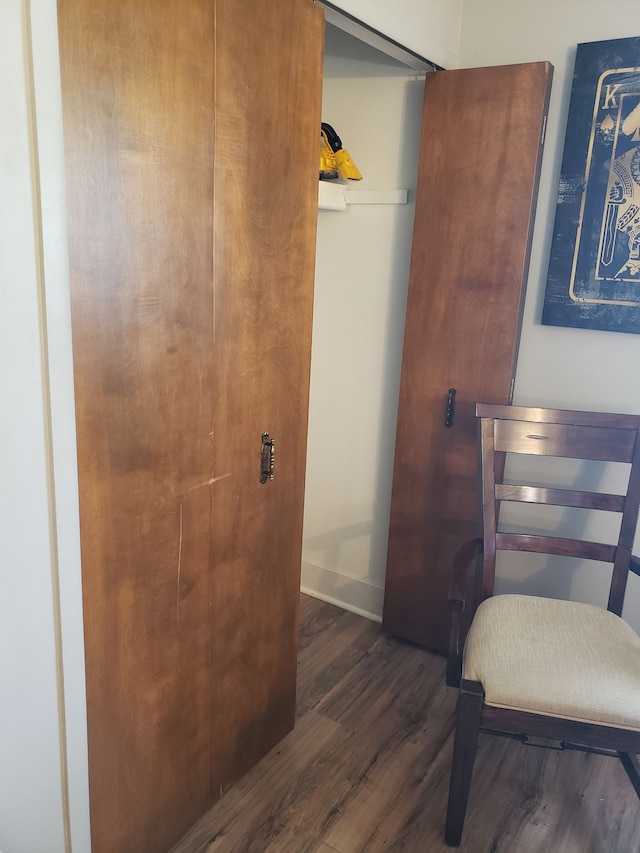 15701 Middlebelt Rd, Romulus, MI 48174 - hall with wood finished floors and baseboards