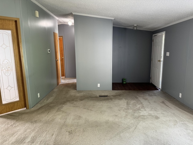 829 Savannah River Dr Unit 82, Adrian, MI 49221 - spare room with carpet, a textured ceiling, and crown molding