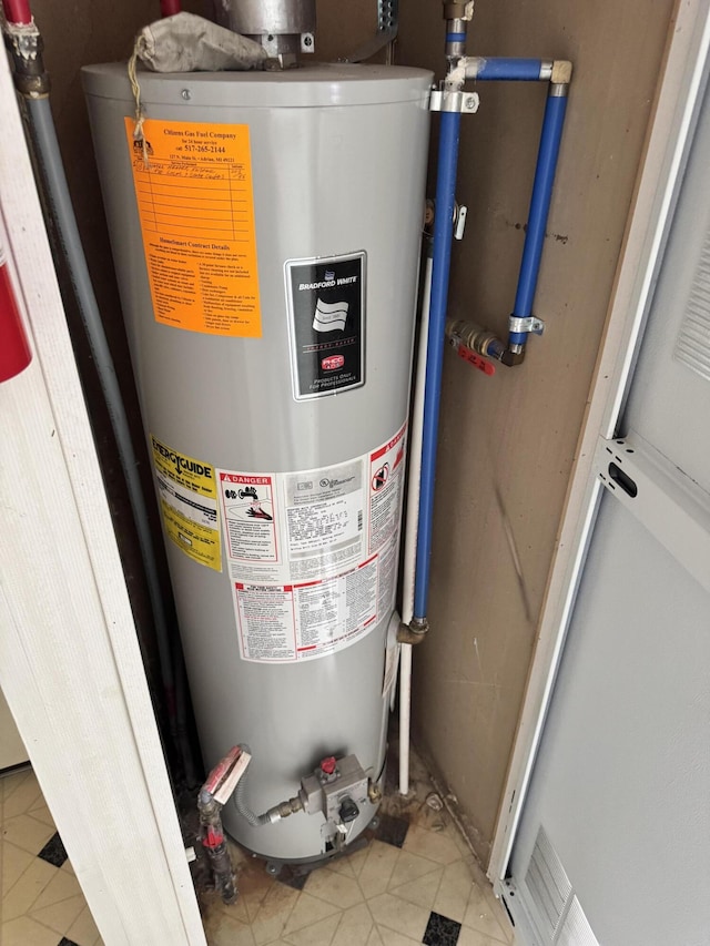 829 Savannah River Dr, Adrian, MI 49221 - utility room with gas water heater
