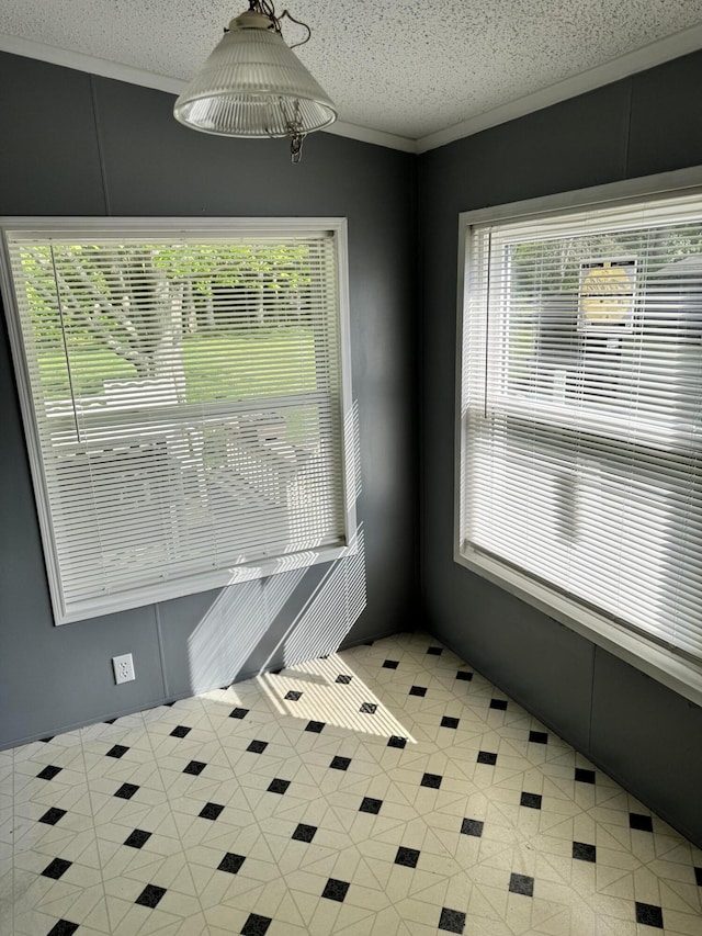829 Savannah River Dr, Adrian, MI 49221 - unfurnished room with healthy amount of natural light, light tile patterned floors, and a textured ceiling
