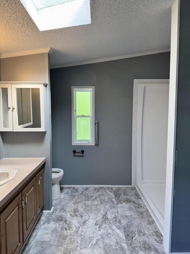 829 Savannah River Dr, Adrian, MI 49221 - bathroom featuring vanity, a skylight, a textured ceiling, and crown molding