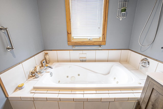 18862 Oxbow Dr, Barryton, MI 49305 - full bathroom featuring a whirlpool tub and vanity