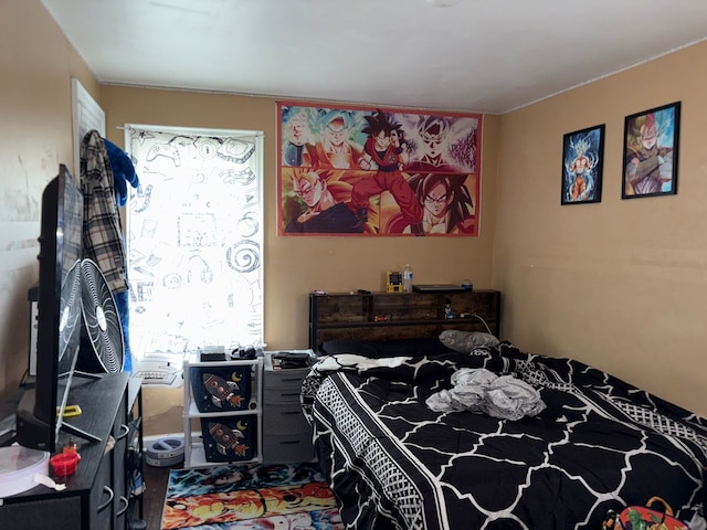 bedroom with multiple windows