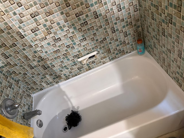 bathroom featuring a bath
