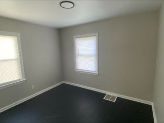 2422 Missouri Ave, Flint, MI 48506 - empty room with baseboards