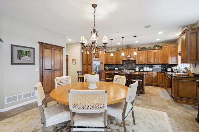 1259 Rose Dr, Niles, MI 49120 - dining area with a chandelier, recessed lighting, and baseboards