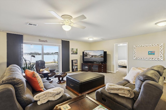 1259 Rose Dr, Niles, MI 49120 - living room featuring carpet floors, a ceiling fan, and baseboards