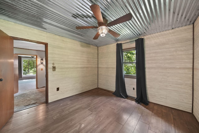 10913 E Railroad St, Clayton, MI 49235 - spare room featuring hardwood / wood-style floors and a ceiling fan