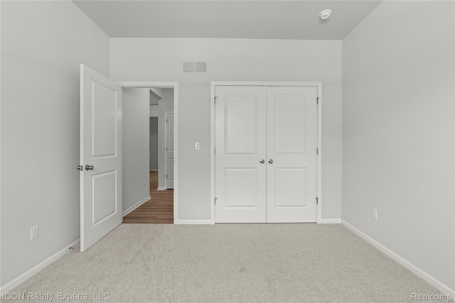 2396 Pondview Ln, Troy, MI 48085 - unfurnished bedroom with carpet and a closet