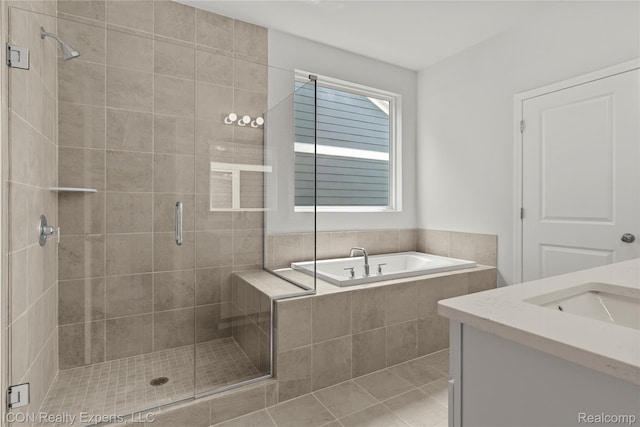 2396 Pondview Ln, Troy, MI 48085 - bathroom with a shower stall, a garden tub, vanity, and tile patterned flooring