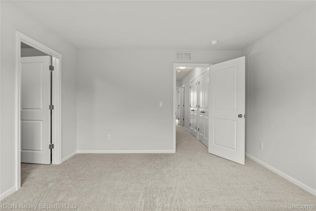 2396 Pondview Ln, Troy, MI 48085 - unfurnished bedroom with carpet flooring and baseboards