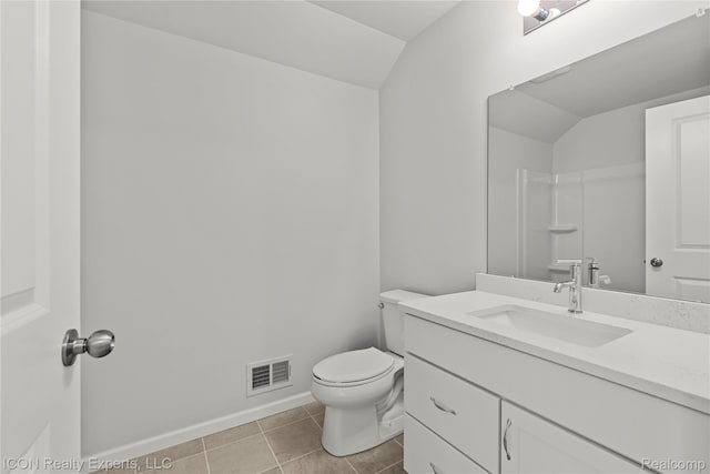 2396 Pondview Ln, Troy, MI 48085 - bathroom with vanity, vaulted ceiling, and tile patterned floors