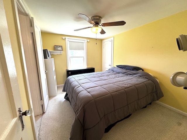 25220 Code Rd, Southfield, MI 48033 - bedroom featuring light carpet, baseboards, and ceiling fan