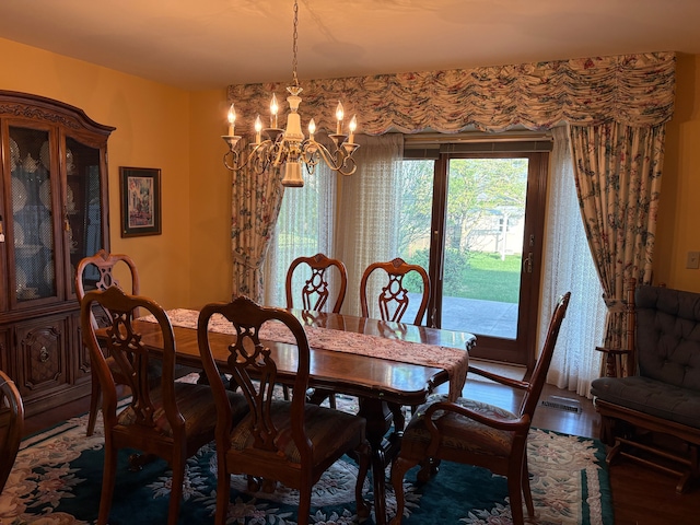 39858 Wilmette Dr, Sterling Heights, MI 48313 - dining space with a chandelier and wood finished floors