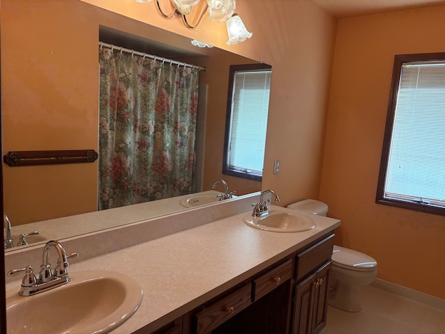 39858 Wilmette Dr, Sterling Heights, MI 48313 - full bathroom with toilet, double vanity, a chandelier, tile patterned flooring, and curtained shower