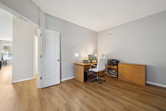 5639 Heathland Cir, Clarkston, MI 48346 - office space featuring wood finished floors and baseboards