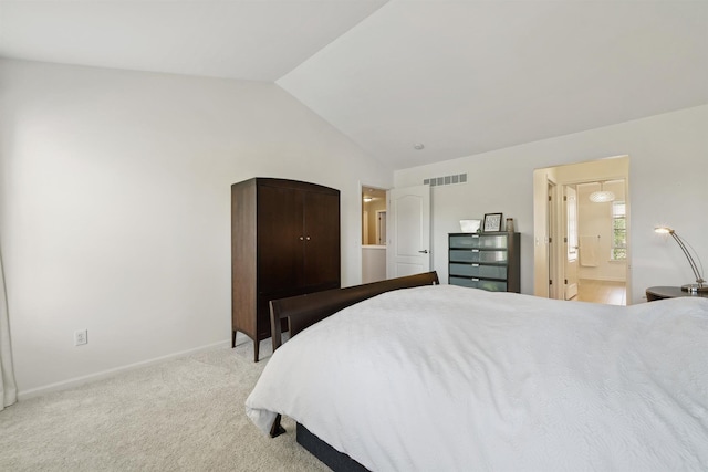 5639 Heathland Cir, Clarkston, MI 48346 - carpeted bedroom featuring vaulted ceiling, baseboards, and ensuite bathroom