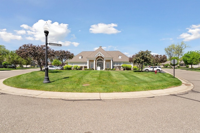 5639 Heathland Cir, Clarkston, MI 48346 - view of front of house with a front lawn