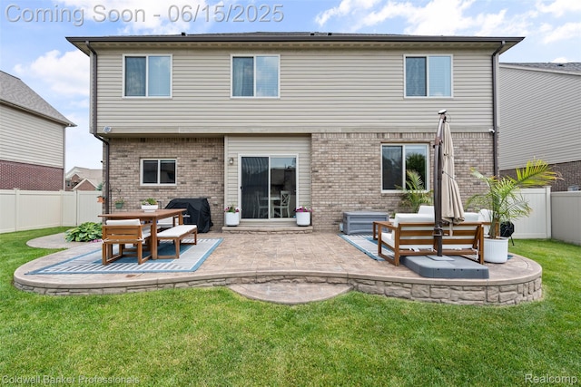 52851 Schafers Run Ct, Chesterfield, MI 48051 - rear view of property featuring a fenced backyard, brick siding, and a patio area