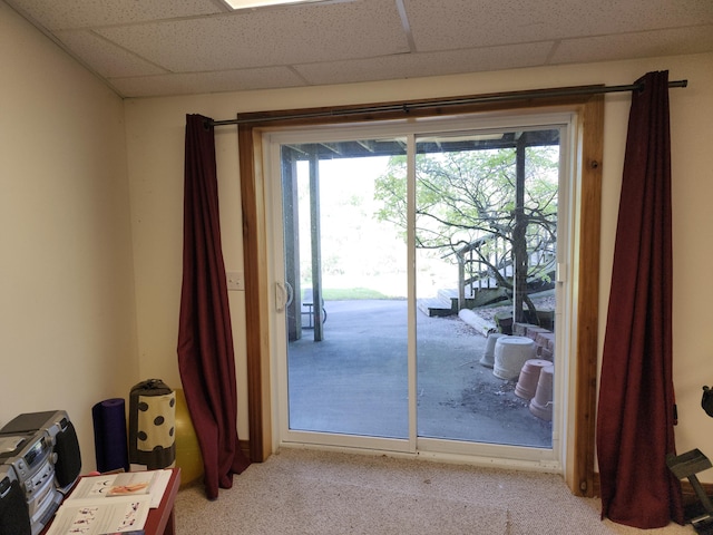 5005 S Brye Rd, Ludington, MI 49431 - doorway to outside featuring a drop ceiling and carpet